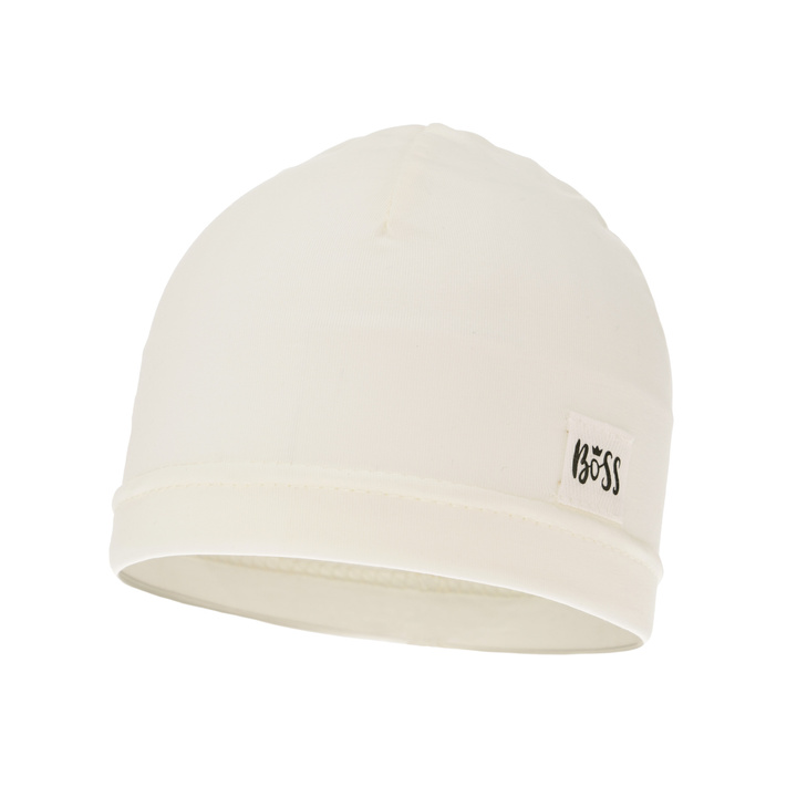 Czapka bawełniana dla chłopca jesienna, wiosenna, kremowa, z naszywką Niki